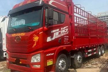 二手青岛解放 JH6重卡 领航版2.0 460马力 8X4 9.4米仓栅式载货车(国五) 前四后八 锡柴二手载货车 黄牌