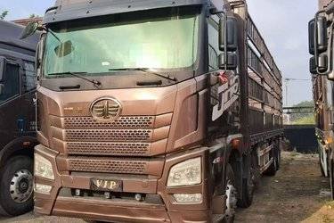 二手青岛解放 JH6重卡 领航版2.0 460马力 8X4 9.4米仓栅式载货车(国六) 前四后八 锡柴二手载货车 黄牌