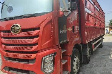二手一汽解放 J6G 领航版 320马力 6X2 9.7米仓栅式载货车(平顶)(国六) 前四后四 锡柴二手载货车 黄牌图片