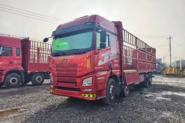 二手青岛解放 JH6重卡 智尊版2.0 460马力 8X4 9.4米仓栅式载货车(速比3.727)(国五) 前四后八 锡柴二手载货车 黄牌图片