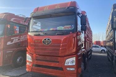 二手青岛解放 JH6重卡 领航版2.0 460马力 8X4 9.5米AMT自动挡仓栅式载货车(速比3.545)(国五) 前四后八 锡柴二手载货车 黄牌图片