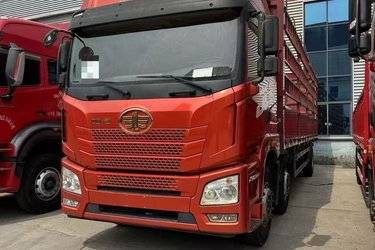 二手青岛解放 JH6重卡 290马力 6X2 9.4米仓栅式载货车(国五) 前四后四 锡柴二手载货车 黄牌
