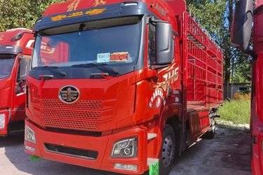 二手青岛解放 JH6 320马力 4X2 6.7米仓栅式载货车(国六) 单桥 锡柴二手载货车 黄牌