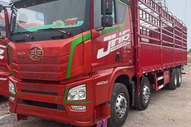 二手青岛解放 JH6重卡 领航版2.0 460马力 8X4 9.4米仓栅式载货车(国五) 前四后八 潍柴二手载货车 黄牌