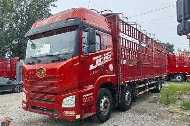 二手青岛解放 JH6重卡 290马力 6X2 9.4米仓栅式载货车(国五) 前四后四 锡柴二手载货车 黄牌