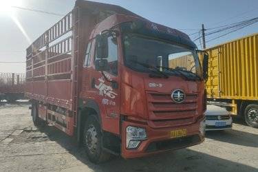 二手青岛解放 JK6中卡 220马力 4X2 6.75米仓栅式载货车(国五) 单桥 锡柴二手载货车 黄牌图片