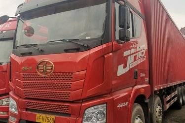二手青岛解放 JH6重卡 430马力 8X4 9.5米翼开启厢式载货车(国五) 前四后八 安徽康明斯二手载货车 黄牌图片