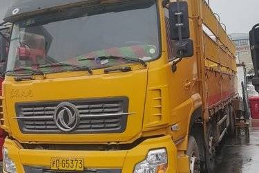 二手东风商用车 天龙重卡 315马力 8X4 9.6米排半仓栅式载货车(国四) 前四后八 康明斯二手载货车 黄牌图片