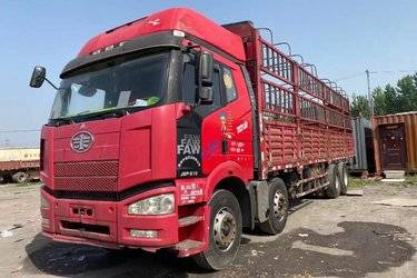 二手一汽解放 J6P重卡 轻量化版 310马力 8X4 9.5米仓栅式载货车(国四) 前四后八 锡柴二手载货车 黄牌图片