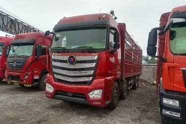 二手福田 欧曼EST 9系重卡 460马力 8X4 9.6米仓栅式载货车(国五) 前四后八 福田康明斯二手载货车 黄牌图片
