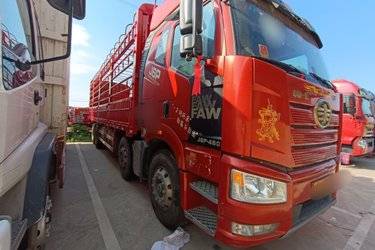 二手一汽解放 新J6P重卡 领航版 460马力 8X4 9.5米仓栅式载货车(国五) 前四后八 锡柴二手载货车 黄牌图片