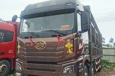 二手青岛解放 JH6重卡 智尊版2.0 460马力 8X4 9.5米仓栅式载货车(速比3.727)(国五) 前四后八 锡柴二手载货车 黄牌图片