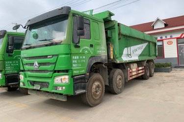 二手中国重汽 HOWO重卡 380马力 8X4 7.8米自卸车(国五) 前四后八 中国重汽二手自卸车 黄牌图片