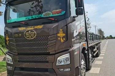 二手青岛解放 JH6重卡 460马力 8X4 9.5米栏板载货车(国五) 前四后八 锡柴二手载货车 黄牌图片