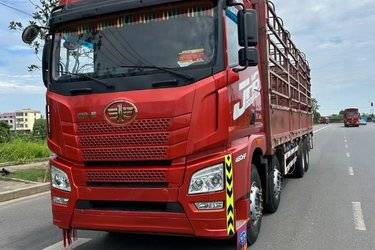 二手青岛解放 JH6重卡 领航版2.0 460马力 8X4 9.5米仓栅式载货车(国五) 前四后八 潍柴二手载货车 黄牌图片
