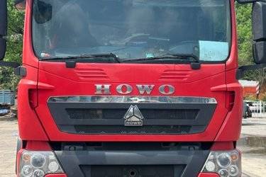 二手中国重汽 HOWO TX重卡 320马力 6X2 9.6米栏板载货车(国五) 前四后四 中国重汽二手载货车 黄牌图片