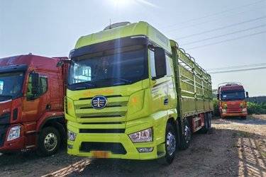 二手一汽解放 J7重卡 460马力 8X4 9.4米仓栅式载货车(国六) 前四后八 锡柴二手载货车 黄牌图片