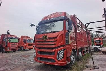 二手一汽解放 J6V 520马力 8X4 9.5米仓栅式载货车(国六) 前四后八 锡柴二手载货车 黄牌图片