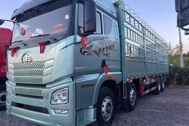 二手青岛解放 JH6 智享版 520马力 8X4 9.5米仓栅式载货车(国六) 前四后八 潍柴二手载货车 黄牌