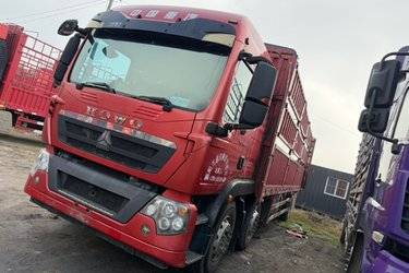 中国重汽 HOWO T5G重卡 310马力 8X4 9.52米仓栅式载货车(国五) 前四后八 曼二手载货车 黄牌 中国重汽 HOWO T5G重卡 310马力 8X4 9.52米仓栅式载货车(国五) 前四后八 曼二手载货车 黄牌