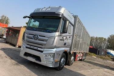 二手一汽解放 J7重卡 经典版 460马力 8X4 9.5米仓栅式载货车(国六) 前四后八 锡柴二手载货车 黄牌图片