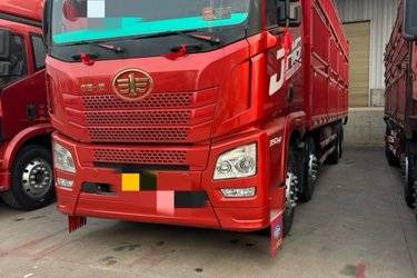 二手青岛解放 JH6 智享版 350马力 6X2 9.5米仓栅式载货车(国六) 前四后四 潍柴二手载货车 黄牌