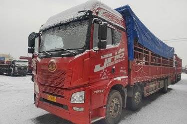 二手青岛解放 JH6重卡 领航版2.0 290马力 6X2 9.5米仓栅式载货车(国六)(4.1速比)(国六) 前四后四 锡柴二手载货车 黄牌