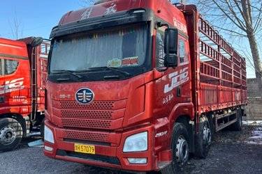 二手青岛解放 JH6重卡 290马力 6X2 9.4米仓栅式载货车(国五) 前四后四 锡柴二手载货车 黄牌