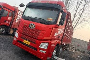 二手青岛解放 JH6重卡 领航版2.0 290马力 6X2 9.5米仓栅式载货车(国五) 前四后四 锡柴二手载货车 黄牌