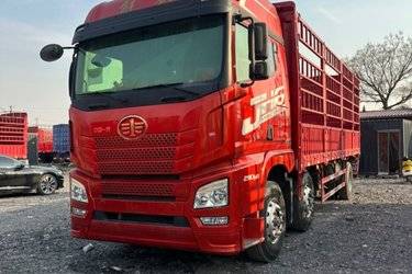 二手青岛解放 JH6重卡 领航版2.0 290马力 6X2 7.7米仓栅式载货车(国六) 前四后四 锡柴二手载货车 黄牌