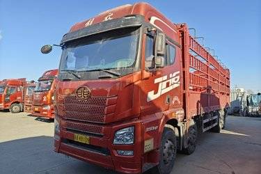 二手青岛解放 JH6重卡 350马力 8X4 9.5米仓栅式载货车(国五) 前四后八 锡柴二手载货车 黄牌