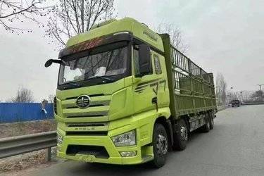 二手一汽解放 J7重卡 经典版 560马力 8X4 9.4米仓栅式载货车(液缓)(465后桥)(国六) 前四后八 锡柴二手载货车 黄牌