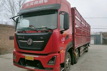 二手东风商用车 天龙KL 舒适版 300马力 6X2 9.6米仓栅式载货车(高顶)(国六) 前四后四 雷诺二手载货车 黄牌