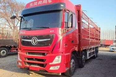 二手东风商用车 天龙旗舰KX 王者版 560马力 8X4 9.4米仓栅式载货车(国六) 前四后八 东风康明斯二手载货车 黄牌图片