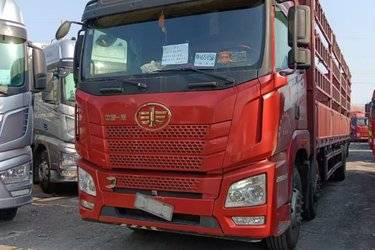 二手青岛解放 JH6重卡 290马力 6X2 9.4米仓栅式载货车(后桥457升级冲焊桥)(国五) 前四后四 锡柴二手载货车 黄牌