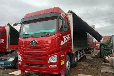 二手青岛解放 JH6重卡 领航版2.0 290马力 6X2 9.4米厢式载货车(后桥435)(国五) 前四后四 锡柴二手载货车 黄牌