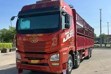 二手青岛解放 JH6重卡 领航版2.0 420马力 8X4 9.4米仓栅式载货车(国五) 前四后八 锡柴二手载货车 黄牌