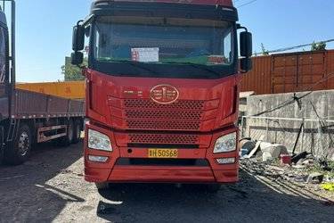 二手青岛解放 JH6重卡 430马力 8X4 9.5米仓栅式载货车(国五) 前四后八 潍柴二手载货车 黄牌
