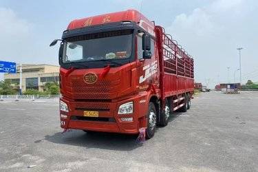 二手青岛解放 JH6重卡 460马力 8X4 9.5米仓栅式载货车(潍柴)(国五) 前四后八 潍柴二手载货车 黄牌图片