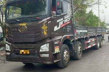 二手青岛解放 JH6重卡 420马力 8X4 9.4米载货车(国五) 前四后八 一汽二手载货车 黄牌图片