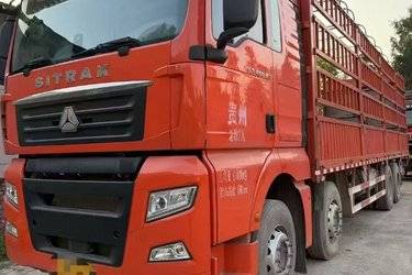 二手中国重汽 汕德卡SITRAK G7重卡 460马力 8X4 9.6米仓栅式货车(国六) 前四后八 中国重汽二手载货车 黄牌图片