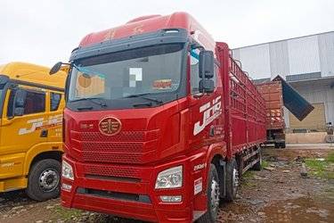 二手青岛解放 JH6重卡 290马力 6X2 9.4米仓栅式载货车(后桥457升级冲焊桥)(国五) 前四后四 锡柴二手载货车 黄牌
