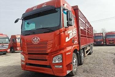二手青岛解放 JH6 智尊版2.0 520马力 8X4 9.5米AMT自动档仓栅式载货车(国六) 前四后八 锡柴二手载货车 黄牌