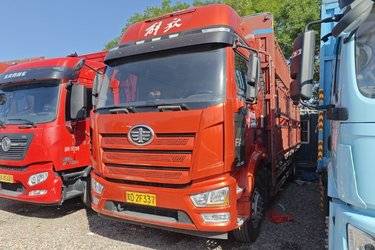 二手一汽解放 J6L中卡 尊享版 260马力 4X2 6.75米仓栅式载货车(国六) 单桥 锡柴二手载货车 黄牌图片