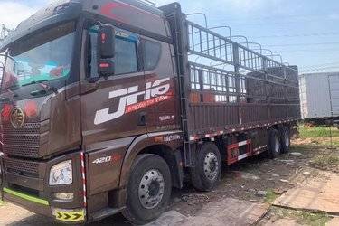 二手青岛解放 JH6重卡 420马力 8X4 9.5米仓栅式载货车(国五) 前四后八 锡柴二手载货车 黄牌