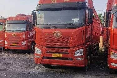 二手青岛解放 JH6重卡 领航版2.0 460马力 8X4 9.5米仓栅式载货车(国五) 前四后八 锡柴二手载货车 黄牌