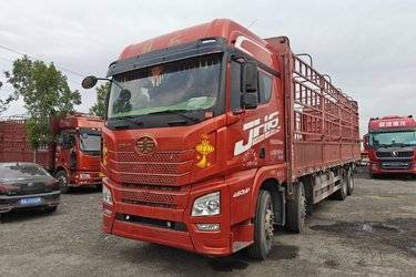 二手青岛解放 JH6重卡 领航版2.0 460马力 8X4 9.5米仓栅式载货车(国六) 前四后八 锡柴二手载货车 黄牌