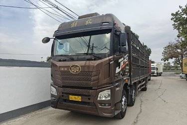 二手青岛解放 JH6重卡 290马力 6X2 9.5米仓栅式载货车(国五) 前四后四 锡柴二手载货车 黄牌