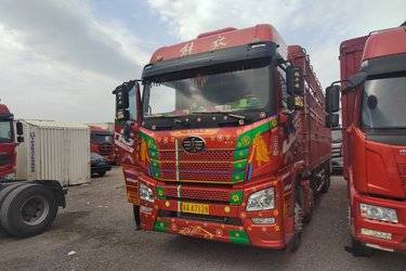 二手青岛解放 JH6重卡 350马力 8X4 9.4米仓栅式载货车(国五) 前四后八 锡柴二手载货车 黄牌