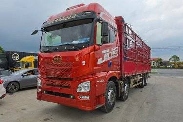 二手青岛解放 JH6重卡 领航版2.0 460马力 8X4 9.5米仓栅式载货车(国五) 前四后八 潍柴二手载货车 黄牌